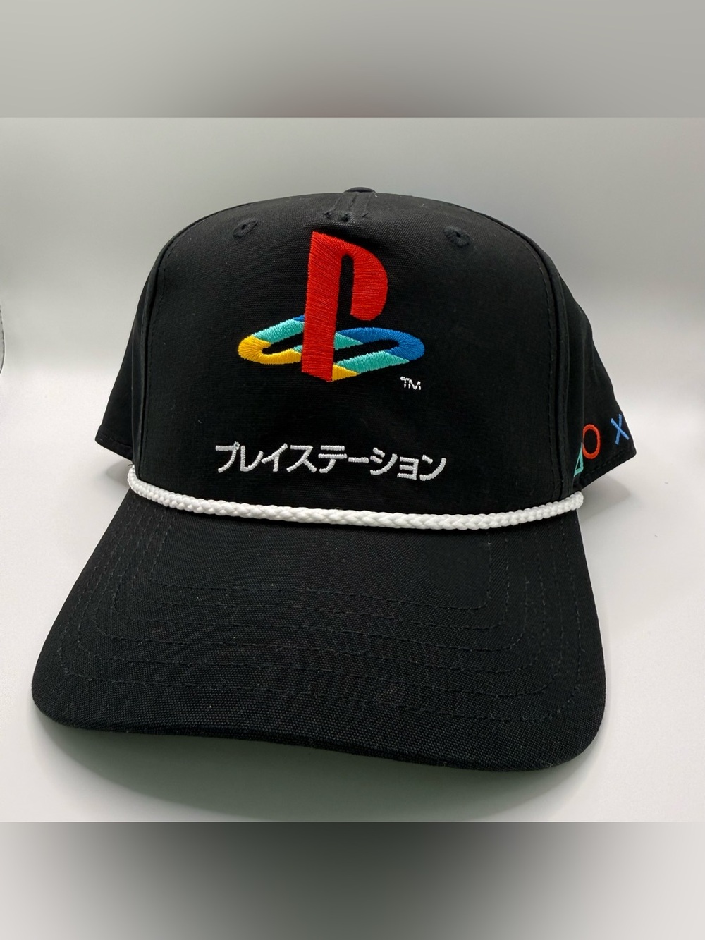 Sony Black Cap with Colorful PlayStation Logo and White Rope